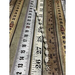 Elegant Textured Silver-Plated Leaf-Link Bracelet With Lobster Clasp Closure